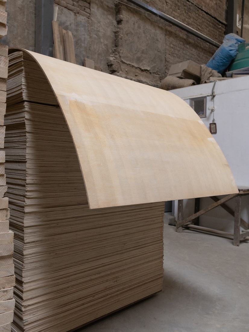 Flexi ply sheet bending over a stack