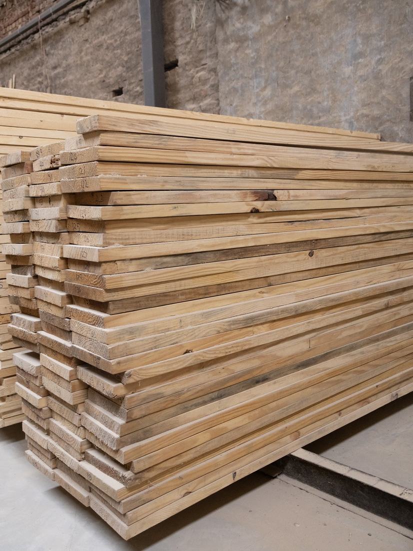 Partal wood planks stacked in the yard